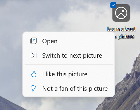 Atnaujinta Windows Spotlight piktograma darbalaukyje, kai įjungtas Spotlight.
